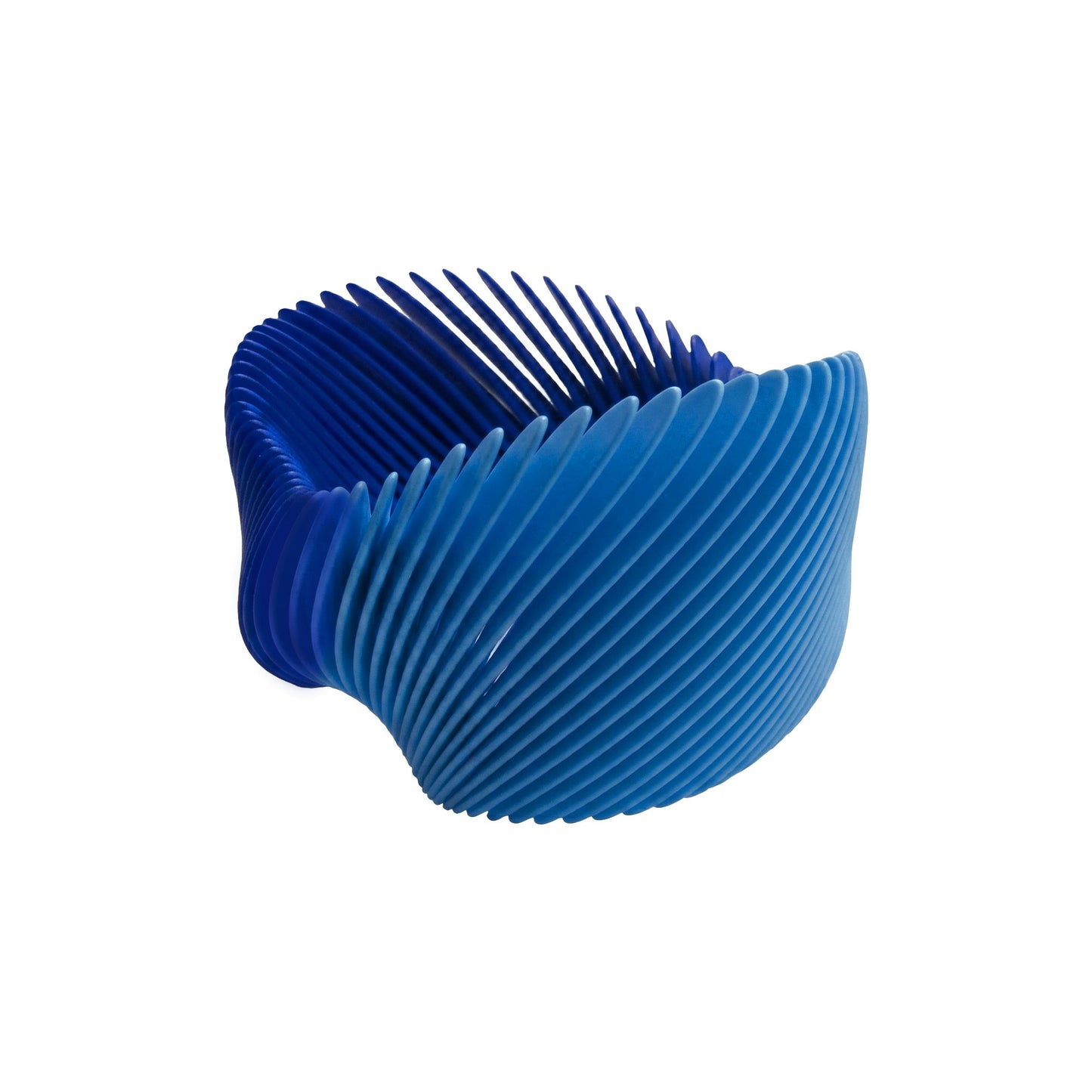 Blue gradient 3D printed flexible nylon bangle by Phase Jewellery on white background.
